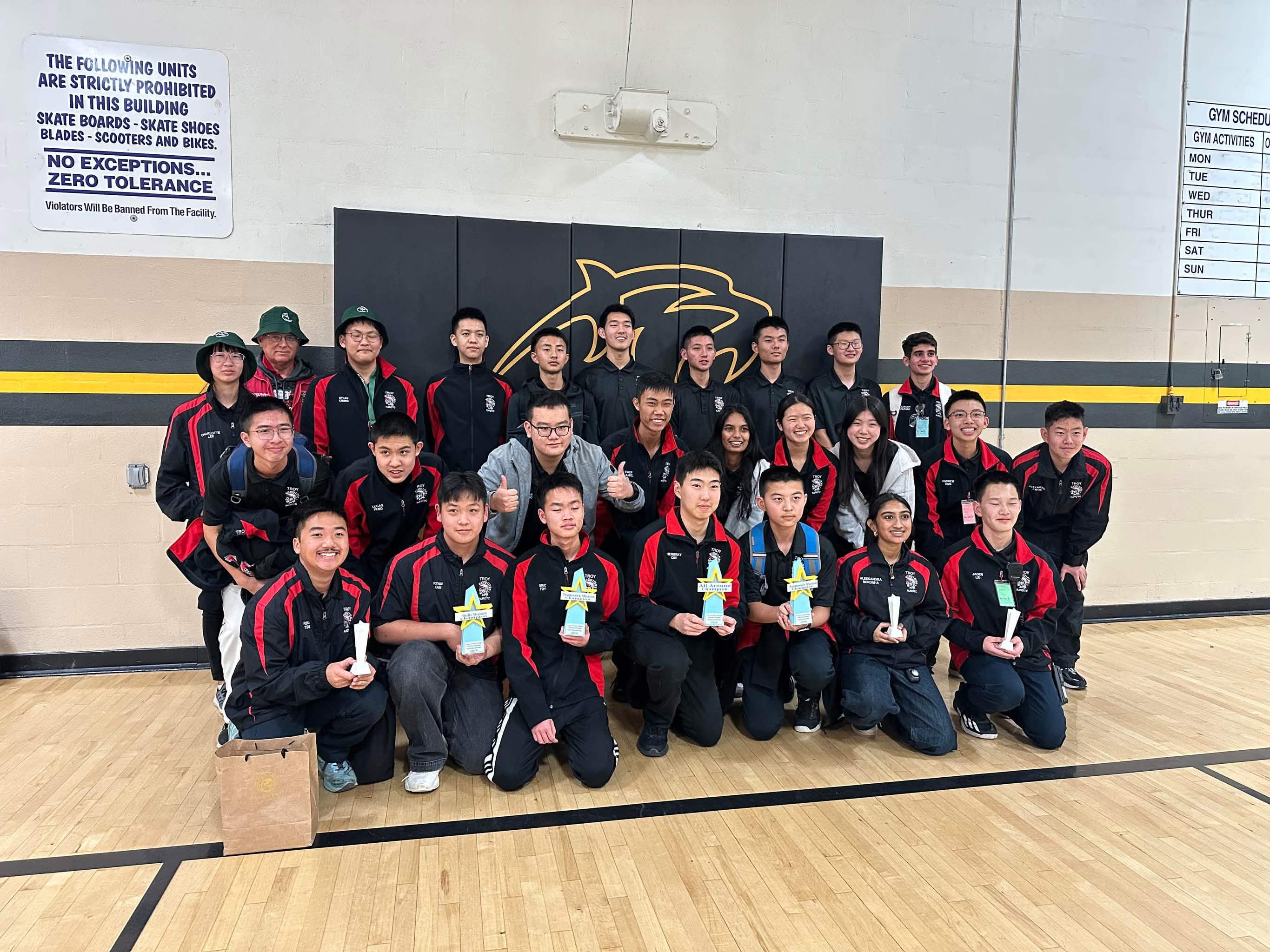 Troy High School NJROTC REC Drones Program with competition trophies